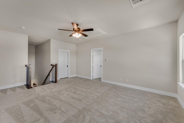 4133 Old Springtown Rd, Weatherford, TX 76085 - unfurnished room with carpet, ceiling fan, visible vents, and attic access
