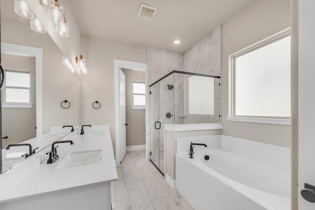 4133 Old Springtown Rd, Weatherford, TX 76085 - bathroom with a bath, marble finish floor, visible vents, and a sink