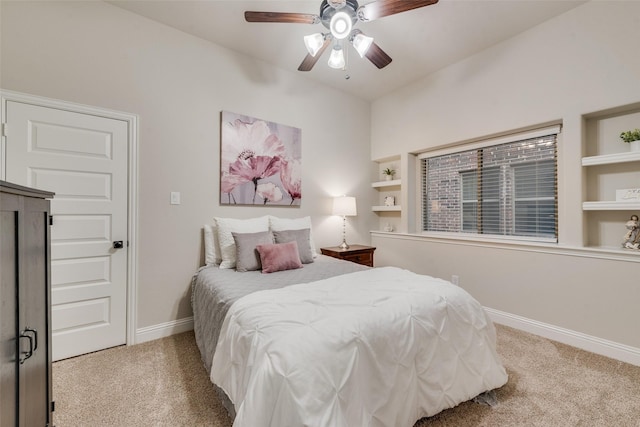 bedroom featuring carpet floors, a ceiling fan, and baseboards