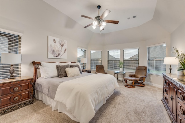 bedroom featuring a ceiling fan, light carpet, baseboards, lofted ceiling, and visible vents