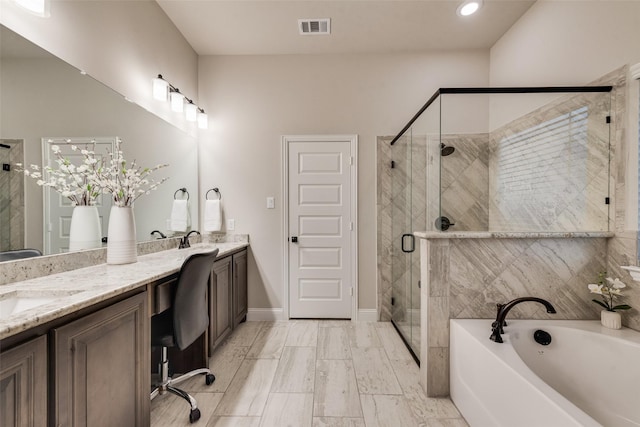 full bathroom with double vanity, visible vents, a garden tub, and a stall shower