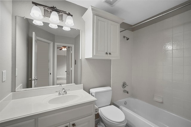 full bath featuring visible vents, toilet, a ceiling fan, vanity, and shower / bathtub combination