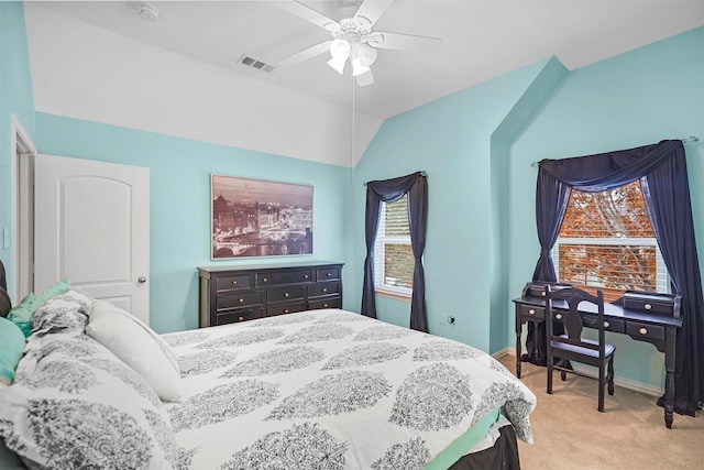bedroom featuring visible vents, baseboards, a ceiling fan, light carpet, and lofted ceiling