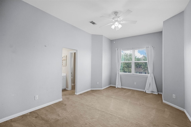 unfurnished bedroom with light carpet, baseboards, ceiling fan, and visible vents