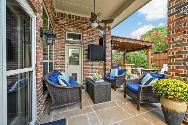 view of patio featuring outdoor lounge area and ceiling fan