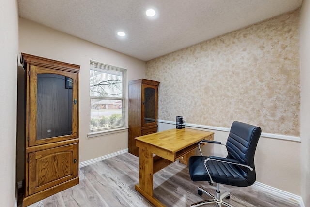 623 Middale Rd, Duncanville, TX 75116 - home office featuring light wood-style floors, baseboards, wallpapered walls, recessed lighting, and a textured ceiling