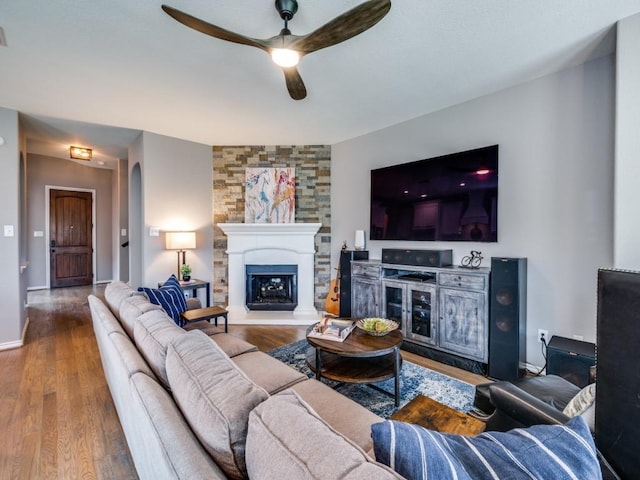 3009 Morning Star Dr, Little Elm, TX 75068 - living room featuring a fireplace, baseboards, a ceiling fan, and wood finished floors
