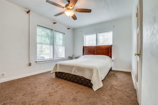 635 Richmondell, Dallas, TX 75211 - bedroom with carpet floors, baseboards, and a ceiling fan
