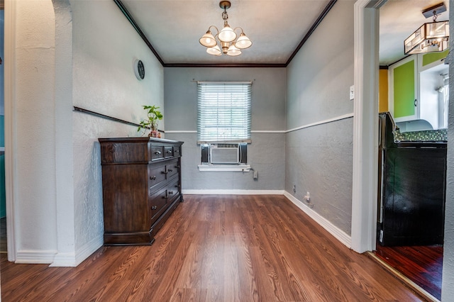 635 Richmondell, Dallas, TX 75211 - foyer entrance featuring cooling unit, a chandelier, crown molding, dark wood-style floors, and baseboards