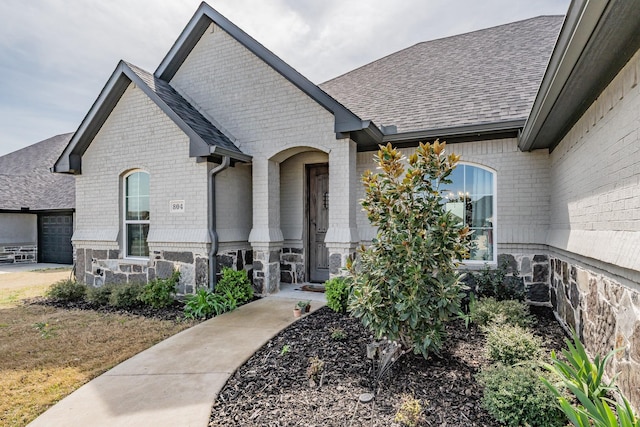 804 Shirley Jean Ln, Collinsville, TX 76233 - view of front of home featuring brick siding, a shingled roof, stone siding, and an attached garage