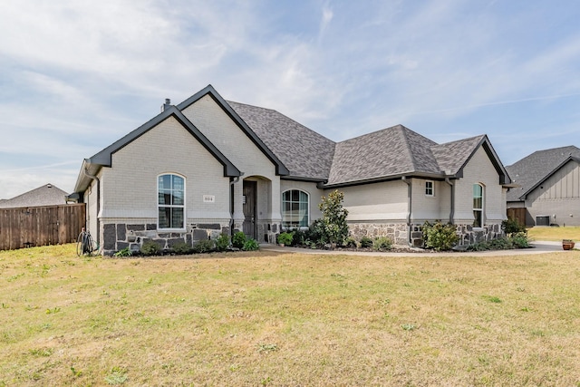 804 Shirley Jean Ln, Collinsville, TX 76233 - french country home featuring brick siding and roof with shingles