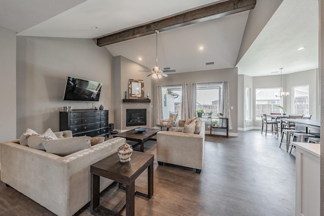 804 Shirley Jean Ln, Collinsville, TX 76233 - living area featuring dark wood finished floors, a glass covered fireplace, ceiling fan, baseboards, and a chandelier