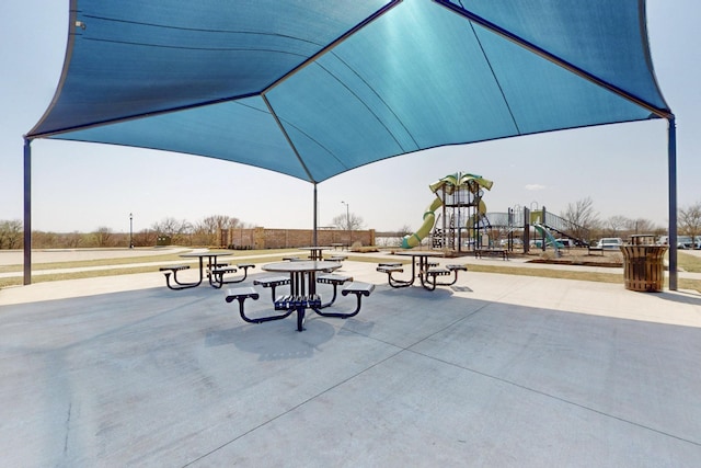 view of home's community featuring playground community