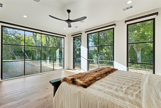 137 Ambrosia Ln, Heath, TX 75032 - bedroom with wood-type flooring and recessed lighting