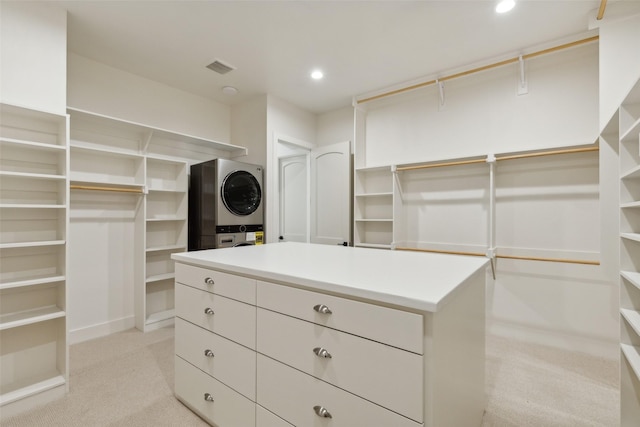 137 Ambrosia Ln, Heath, TX 75032 - walk in closet with stacked washer / drying machine and light carpet