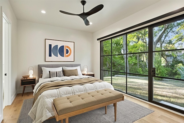 137 Ambrosia Ln, Heath, TX 75032 - bedroom with light wood-type flooring, recessed lighting, and a ceiling fan