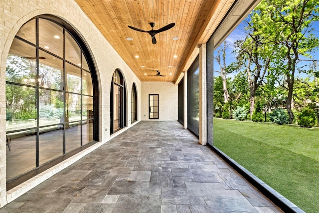 137 Ambrosia Ln, Heath, TX 75032 - unfurnished sunroom with ceiling fan and plenty of natural light