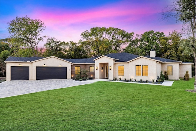 137 Ambrosia Ln, Heath, TX 75032 - view of front of house with a garage, a yard, a chimney, decorative driveway, and a shingled roof