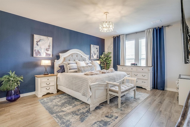 10600 Barrington Ln, Fort Worth, TX 76126 - bedroom with an inviting chandelier, baseboards, visible vents, and light wood-type flooring