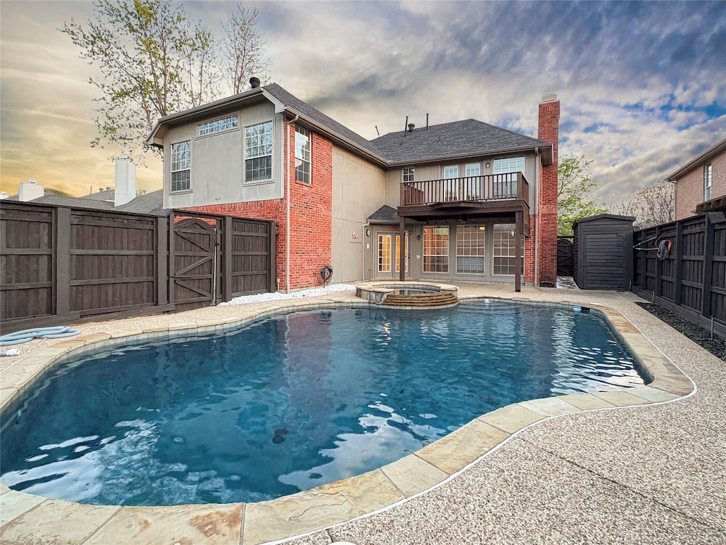 11612 Alexandria Dr, Frisco, TX 75035 - view of pool featuring a pool with connected hot tub and a fenced backyard