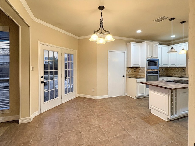 unfurnished living room with ceiling fan, light wood-type flooring, visible vents, baseboards, and plenty of natural light