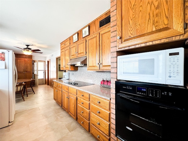 220 N 15th Ave, Munday, TX 76371 - kitchen featuring a ceiling fan, tasteful backsplash, under cabinet range hood, black appliances, and brown cabinetry