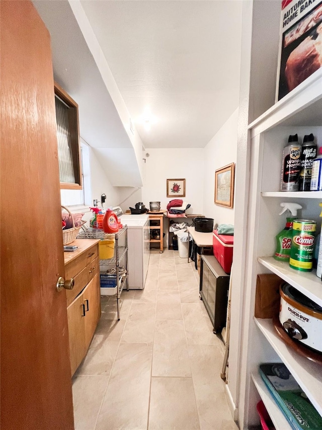 220 N 15th Ave, Munday, TX 76371 - interior space featuring washing machine and dryer and light tile patterned floors
