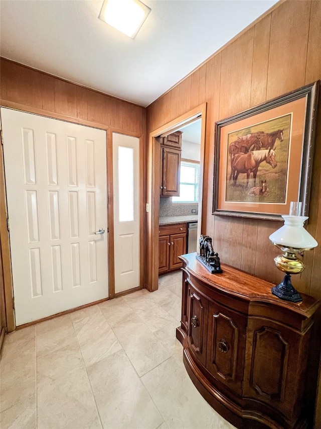 220 N 15th Ave, Munday, TX 76371 - foyer entrance featuring wood walls