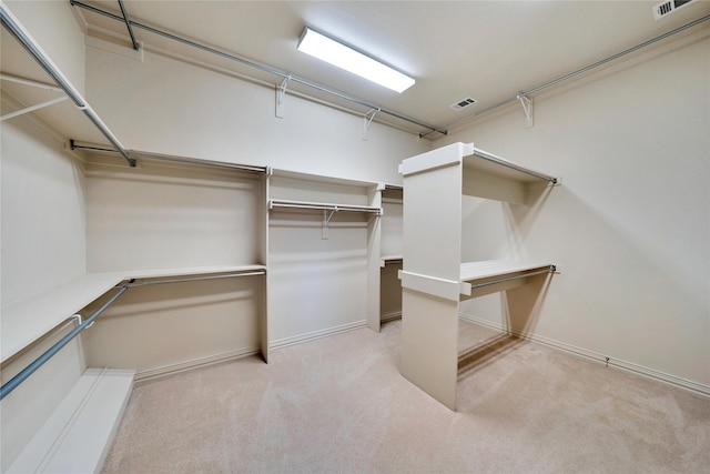 5460 Stone Canyon Dr, Frisco, TX 75034 - spacious closet featuring visible vents and carpet floors