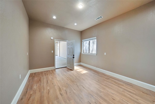 5460 Stone Canyon Dr, Frisco, TX 75034 - spare room with light wood-style floors, baseboards, and recessed lighting