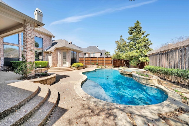 5460 Stone Canyon Dr, Frisco, TX 75034 - view of pool featuring a fenced backyard and a pool with connected hot tub