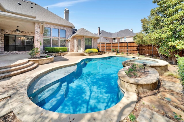 5460 Stone Canyon Dr, Frisco, TX 75034 - view of swimming pool with a fenced backyard and a pool with connected hot tub