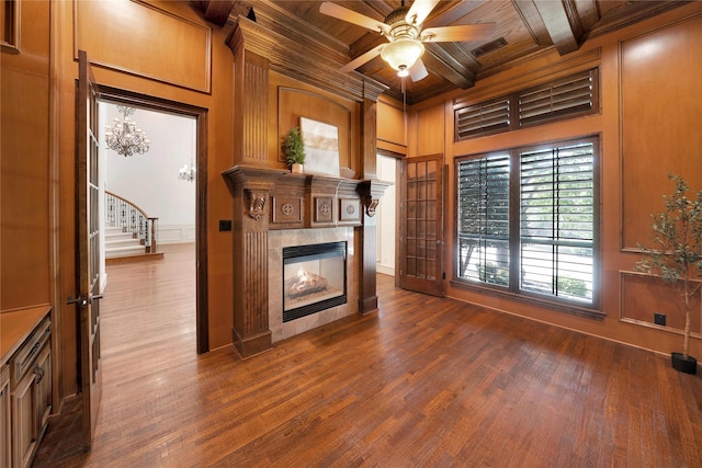 5460 Stone Canyon Dr, Frisco, TX 75034 - unfurnished living room with wood ceiling, beam ceiling, a tiled fireplace, dark wood-style floors, and stairs