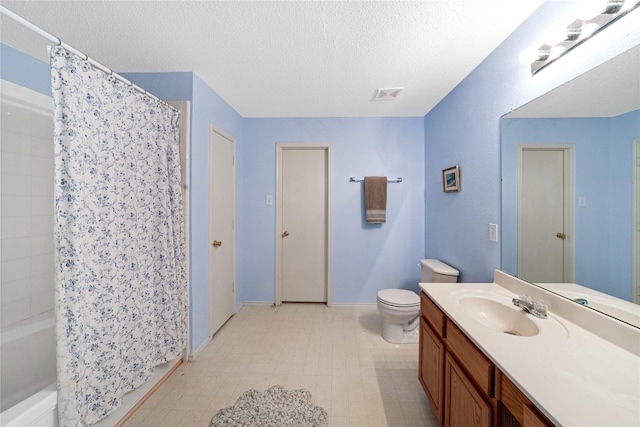 600 Carol Way, Euless, TX 76039 - bathroom with vanity, a textured ceiling, and shower / bathtub combination with curtain