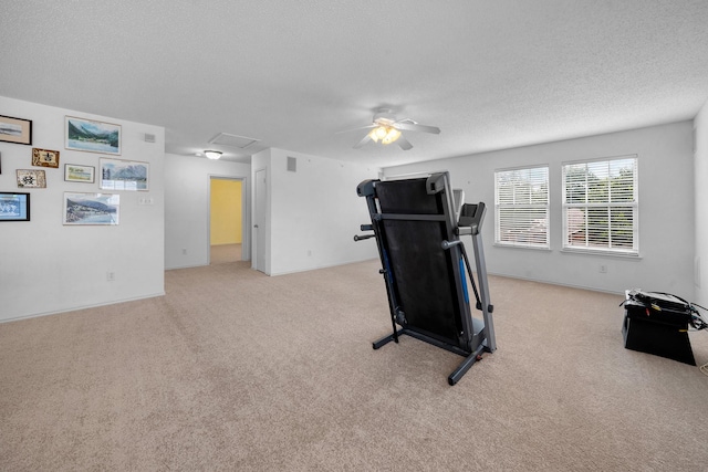 600 Carol Way, Euless, TX 76039 - workout room with carpet, ceiling fan, attic access, and a textured ceiling