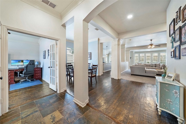 5218 Pueblo Ln, Frisco, TX 75034 - hallway featuring a desk, arched walkways, ornamental molding, decorative columns, and baseboards