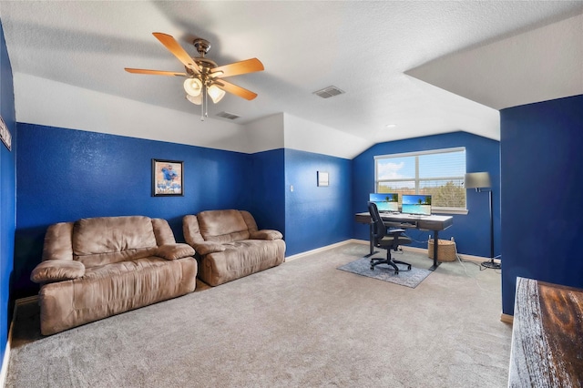 5218 Pueblo Ln, Frisco, TX 75034 - carpeted home office with lofted ceiling, baseboards, ceiling fan, and a textured ceiling