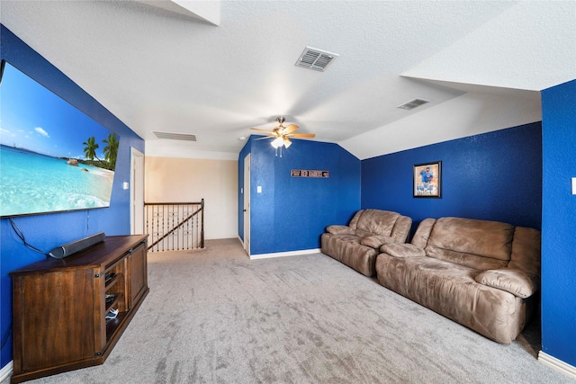 5218 Pueblo Ln, Frisco, TX 75034 - carpeted living room featuring vaulted ceiling, baseboards, a ceiling fan, and a textured ceiling