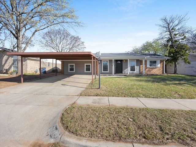 541 Mesquite Ave, Crowley, TX 76036 - single story home featuring a front lawn, a carport, and concrete driveway