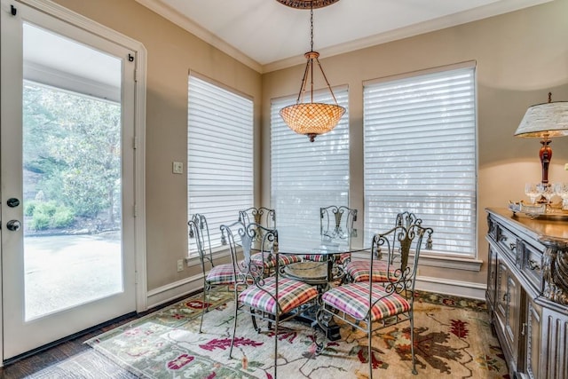 4592 Biltmoore Dr, Frisco, TX 75034 - dining room featuring crown molding, baseboards, and wood finished floors