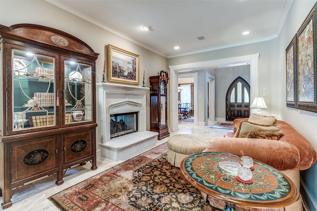 4592 Biltmoore Dr, Frisco, TX 75034 - living area with crown molding, a fireplace with raised hearth, and recessed lighting