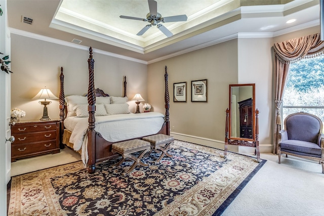 4592 Biltmoore Dr, Frisco, TX 75034 - carpeted bedroom with a raised ceiling, crown molding, baseboards, and a ceiling fan