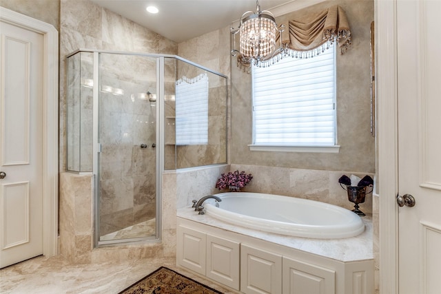 4592 Biltmoore Dr, Frisco, TX 75034 - bathroom with a shower stall, a bath, and a chandelier