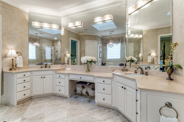 4592 Biltmoore Dr, Frisco, TX 75034 - bathroom with a skylight, crown molding, a shower stall, and vanity