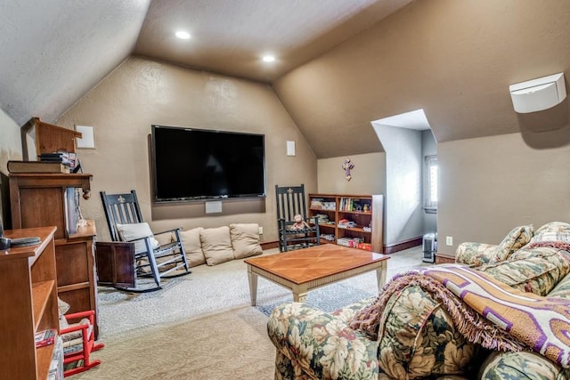 4592 Biltmoore Dr, Frisco, TX 75034 - carpeted living area featuring lofted ceiling and baseboards