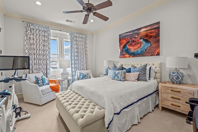 bedroom with visible vents, recessed lighting, crown molding, and light colored carpet