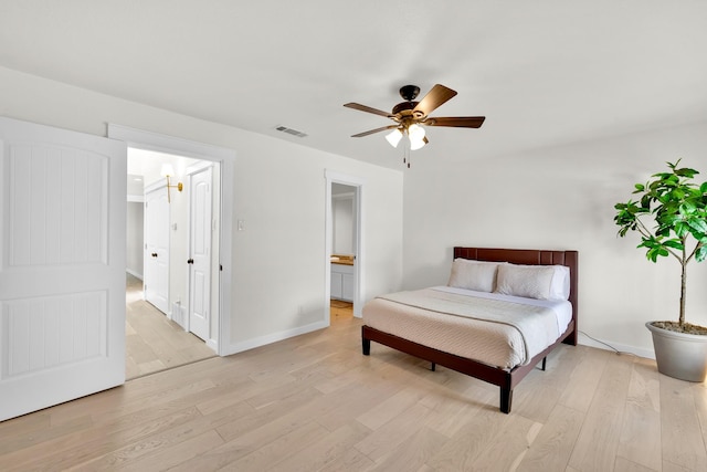 9231 Chimney Corner Ln, Dallas, TX 75243 - bedroom with light wood-style flooring, ceiling fan, and ensuite bath