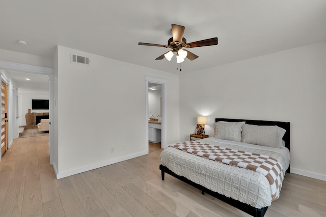 9231 Chimney Corner Ln, Dallas, TX 75243 - bedroom with light wood-style floors, a ceiling fan, and recessed lighting