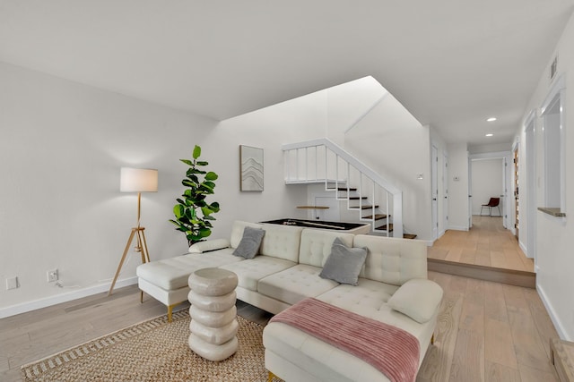 9231 Chimney Corner Ln, Dallas, TX 75243 - living area with recessed lighting, light wood-style flooring, and stairs