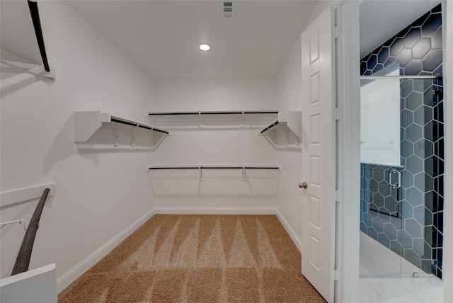 409 Horizon Way, Northlake, TX 76247 - walk in closet featuring visible vents and carpet flooring